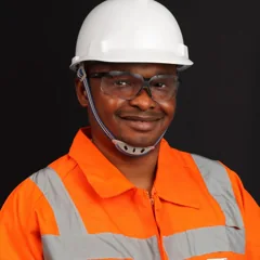 Homme souriant portant une tenue de chantier orange et grise — photo d’illustration
